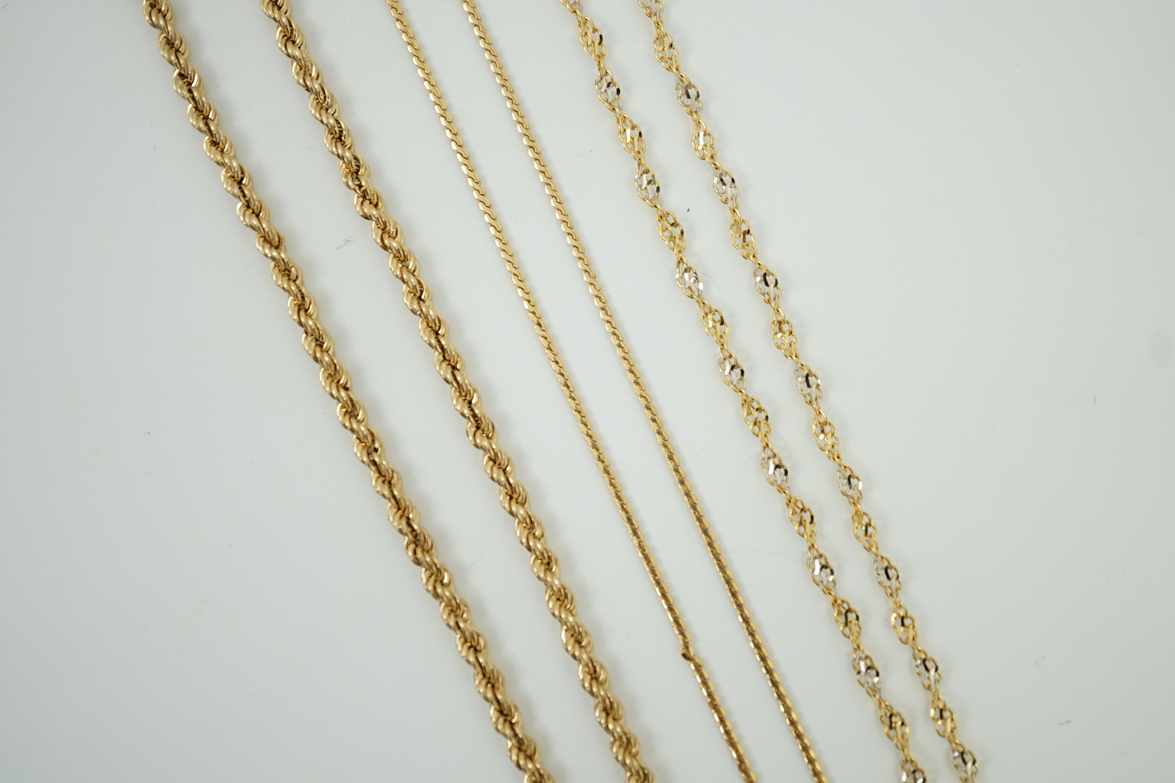 Four assorted modern 9ct gold chains, including rope twist, 39cm, 12.7 grams.